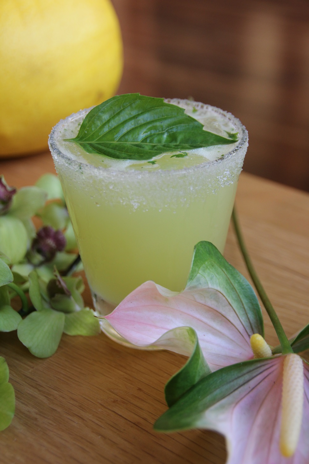 Cocktail with leafy garnish